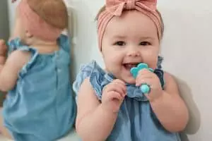 When do I start brushing my baby’s teeth?